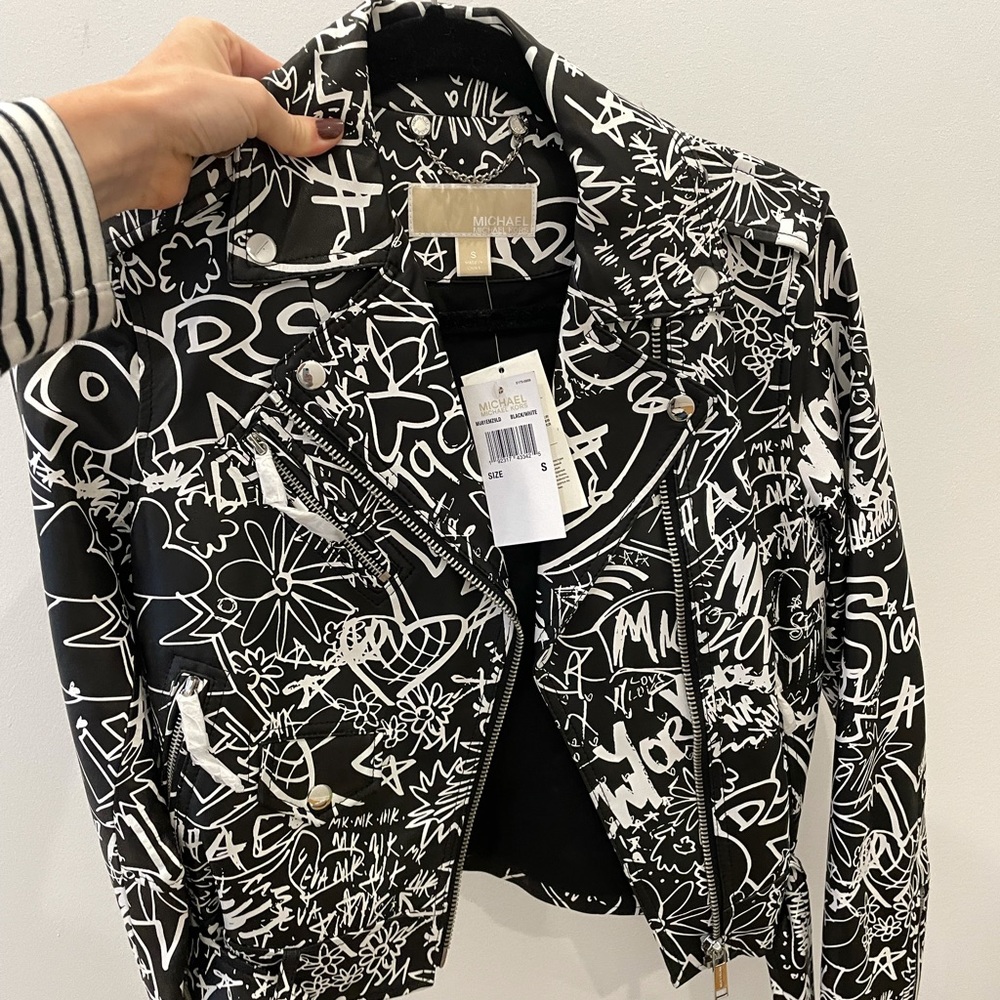 Micheal Kors graffiti print real leather Moro jacket. New with tags. Never worn.
